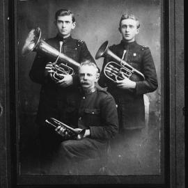 Three unidentified bandsmen in uniform.