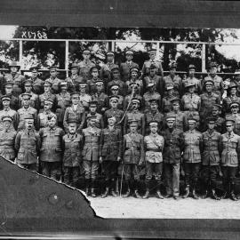 A large posed group of regimental military personal in uniform.