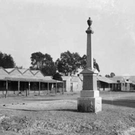 An unnamed street in Euroa with a war memorial in the foreground.