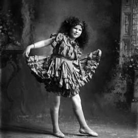 Studio portrait of Miss Adami, a young girl dancer.