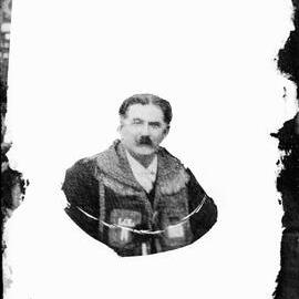 A head and shoulders view of an unidentified man.