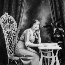 Studio portrait of Miss M. Masson.