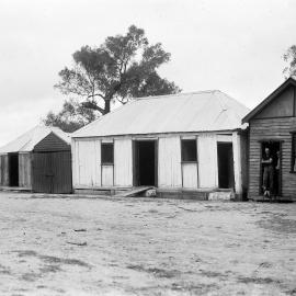A group of  timber buildings in a rural environment, possibly near Benalla.