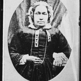 Portrait of an unidentified woman wearing a bonnet.