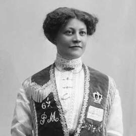 Portrait of Miss Lindsay wearing an embroidered vest of unknown symbolism.