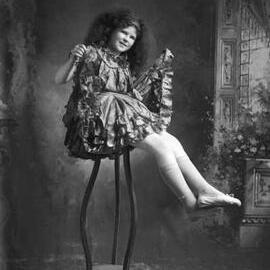 Studio portrait of Miss Adami in costume.