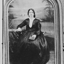 Studio portrait of an unidentified stern woman.