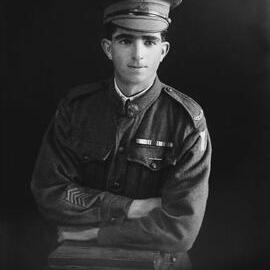 Studio portrait of Mr. B. Wilcox in an Australian Army uniform.