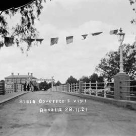 The concrete road bridge at Benalla adorned with bunting  and signage to welcome the Governor of Victoria.