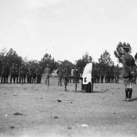 A clergyman addressing troops at a military ceremony in Benalla.