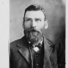 Portrait of an unidentified man with a heavy beard.