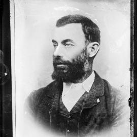 Portrait of a man in a three piece suit.