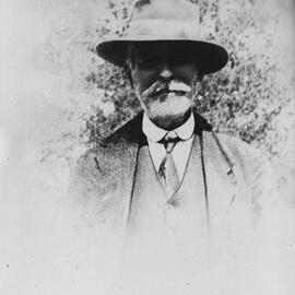 Portrait of an unidentified man wearing a hat.