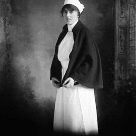 Studio portrait of a woman in a nurse’s uniform.  Family name Cunningham.