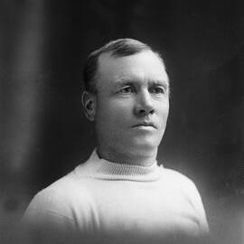 Portrait of an unidentified man wearing a white vest.