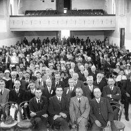 A large hall in Benalla filled with seated men and women, possibly in 1929.