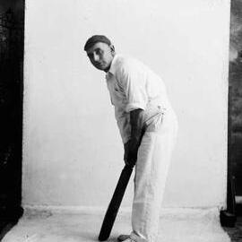 An unidentified cricketer in a studio.