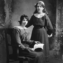 Studio portrait of two young women.  Family name Cahill.