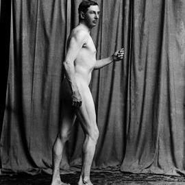 Studio full-length view of a nude man.