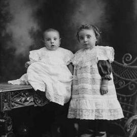 Studio portrait of two young children.  Family name Brodie.