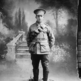 Studio portrait of a man in an Australian Army uniform.  Family name Batty.