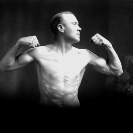 An unidentified man demonstrating a callisthenic pose.