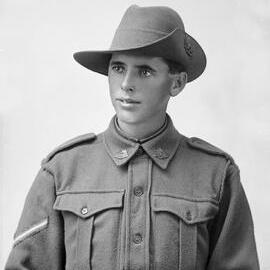 Portrait of a young man wearing an Australian Army uniform.