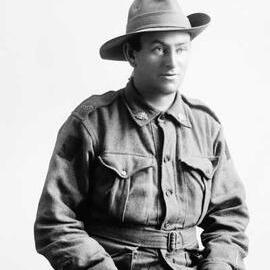 Studio portrait of a man wearing an Australian Army uniform.  Family name Murray.