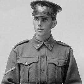 Portrait of a young man wearing an Australian Army uniform.