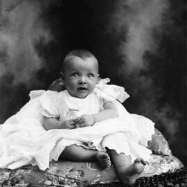 Studio portrait of a baby.  Family name Gibson.