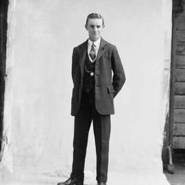 Portrait of a young man in a suit.  Family name Bond.