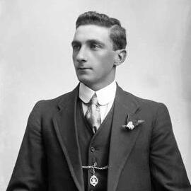 Portrait of a young man wearing an Australian Tramway Employees Association medallion.   Family name Willcocks or Wilcox.