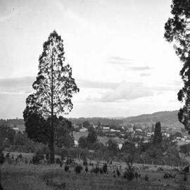 A distant view of an unknown town in a rural environment, possibly in north-eastern Victoria.