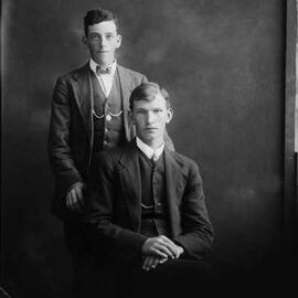 Studio portrait of two young men.  Family name possibly Tanner.