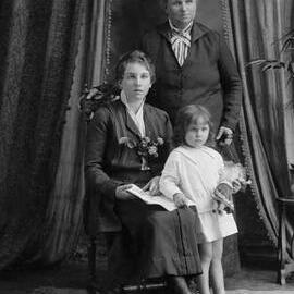 Studio portrait of three females.  Family name Harper.
