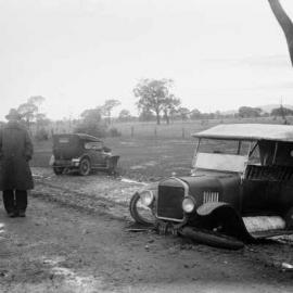 A motoring accident on a wet country road in Victoria.