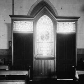 Part of a church interior showing the entrance porch.