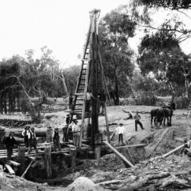 Men and horses working on a bridge construction site, probably in North-eastern Victoria.
