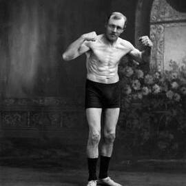 An unidentified man demonstrating a callisthenic pose.