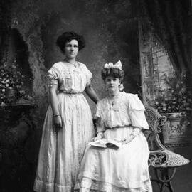 Studio portraits of two young women.  Family names Dudley and Canty.