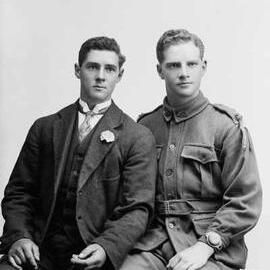 Studio portrait of two young men.   Family name Batten.