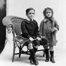 Studio portrait of two children.  Family name Oliver.