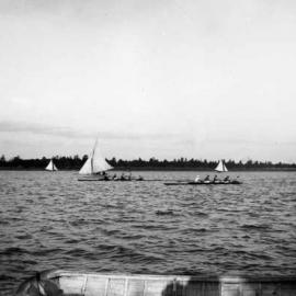 Rowers and yachts on an unidentified lake.