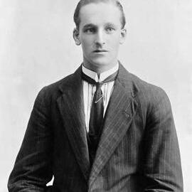 Studio portrait of a young man.  Family name Lucas.