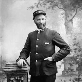 Studio portrait of a uniformed man,  Family name Bennett.