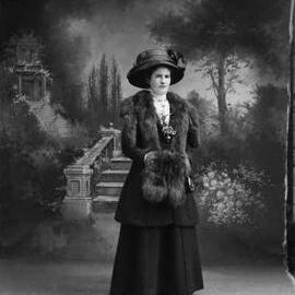 Studio full-length portrait of Miss Rawson.