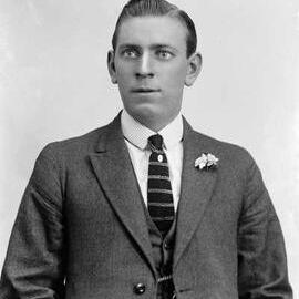 Portrait of a young man wearing a three piece suit.  Family name Clements.