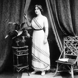Studio full-length portrait of Miss Stowell.