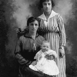 Studio portrait of two women and a baby.  Family name Goldstein.