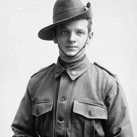 Studio portrait of a young man wearing an Australian Army uniform.